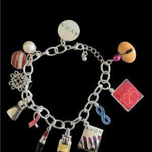 New in Box Avon 125th anniversary charm bracelet